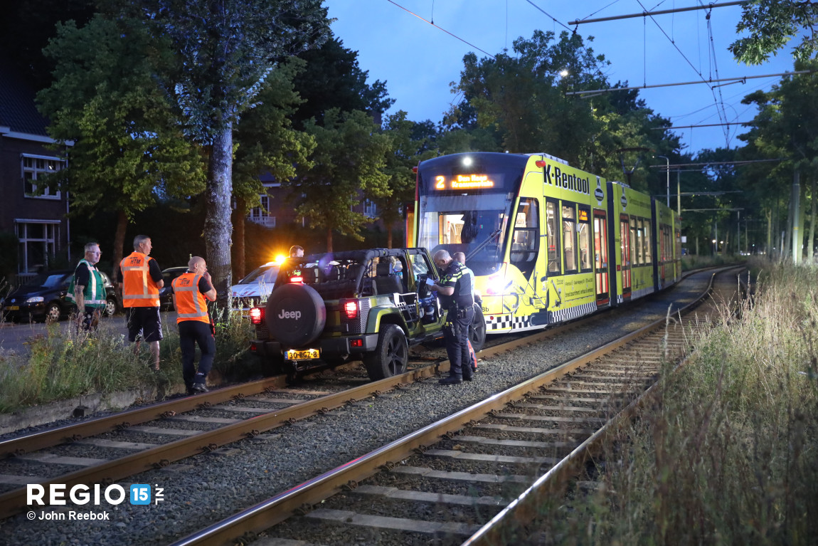 A Jeep driver drives on a tramway and collides with a tram